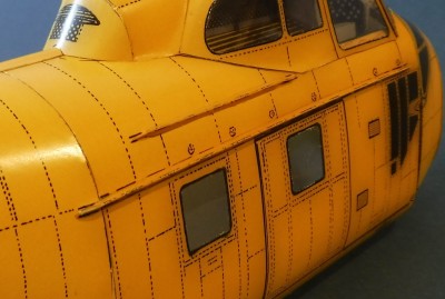 Collez-les ensuite sur les flancs du fuselage.<br /><br />Cordialement,<br /><br />Kurt