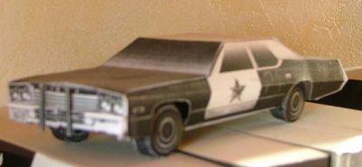 voiture des blues brother, sortie sur une imprimante nir et blanc du boulot
Ben oui, faut bien s'occuper des fois, suivant les postes... En mÃªme temps, lemodÃ¨le Ã©tait noir et blanc, domage cependant que Ã§a sorte en tons de gris sur ces imprimantes, mais je l'ai gardÃ©, je la trouve marrante, et elle fait partie de ma gÃ©nÃ¨se de modÃ©liste papier.
