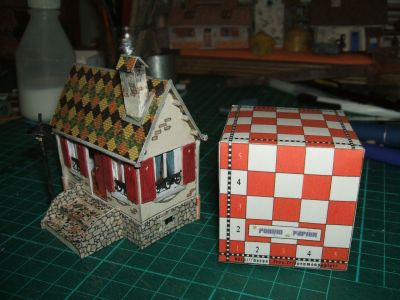 le village de dimanche illustré page 7 la maison de la retraitée
vue par la droite; le chapeau de cheminée aussi en tuiles de luxe 
